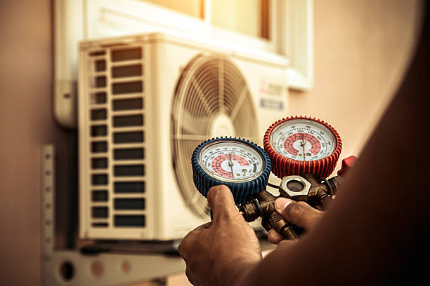 Professional Air Conditioning Service technician working in Earleville, MD